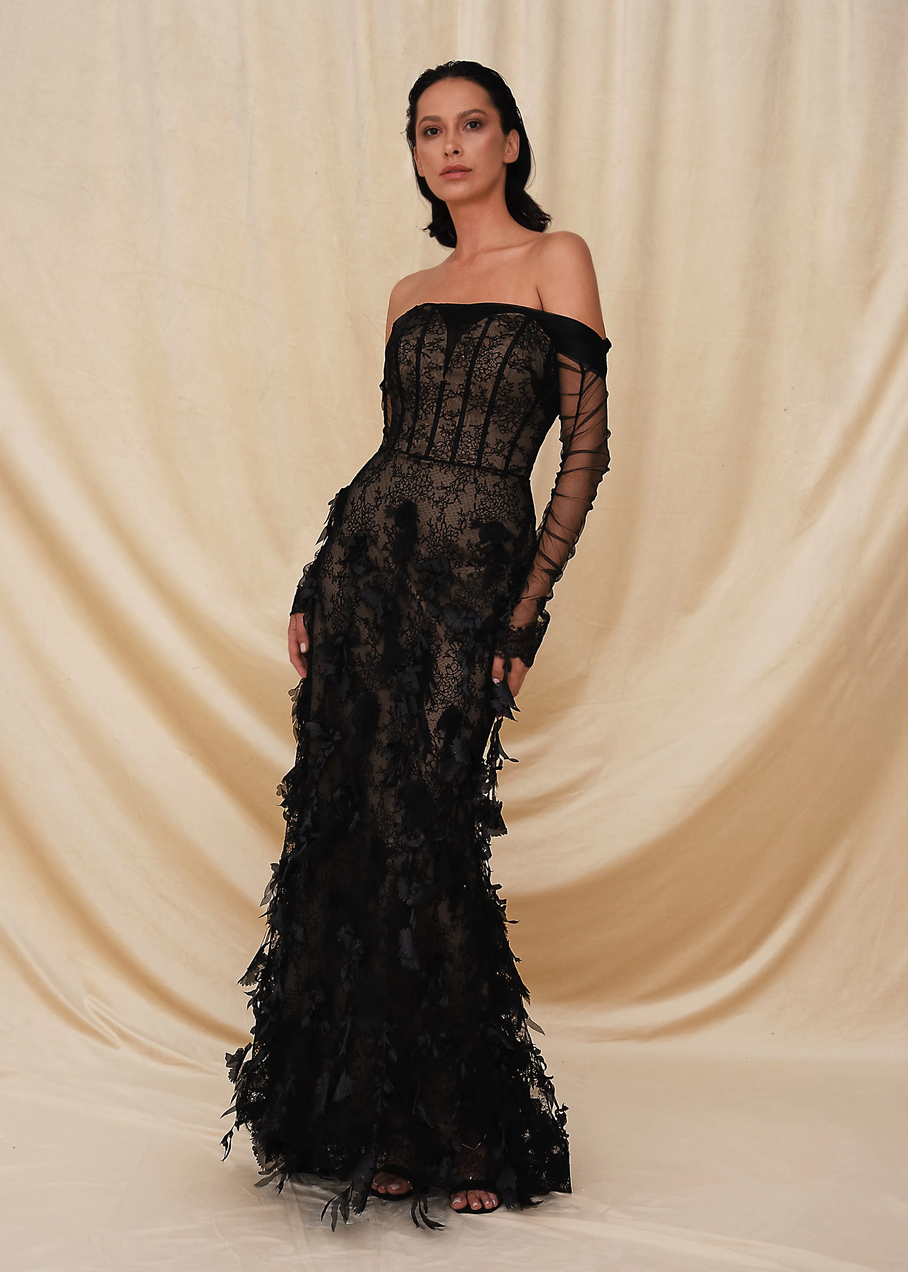 Luxury black off-shoulder lace evening dress featuring Guipure lace, floral appliqués, and pleated tulle sleeves by Obayh Luxury Fashion.