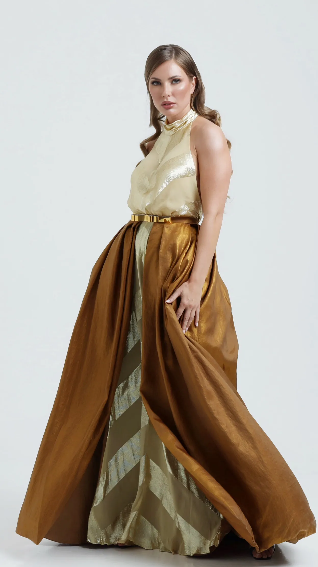 Luxury golden evening dress featuring harmonious gold tones and an elegant couture design for sophisticated occasions by Obayh Luxury Fashion.